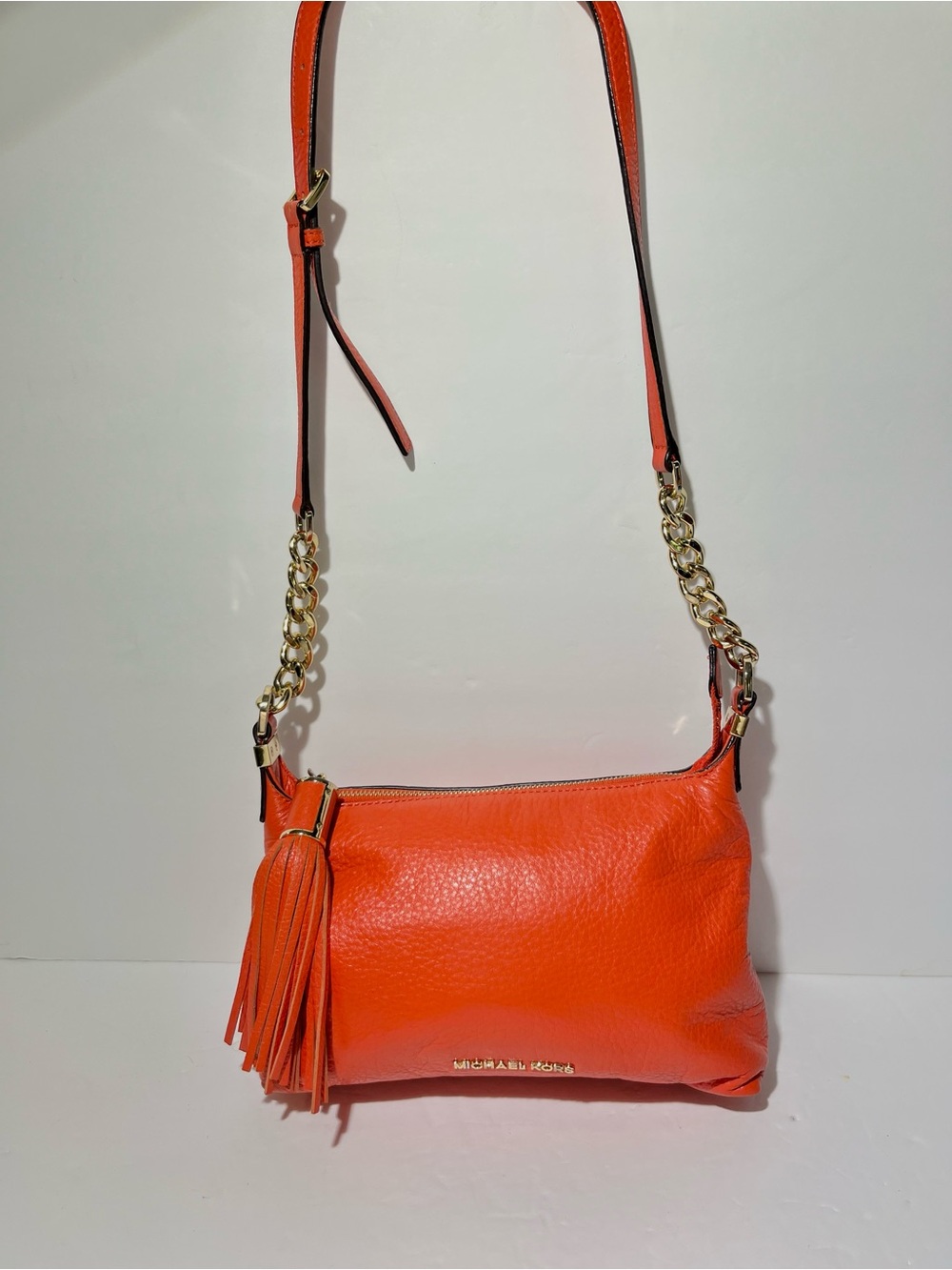 😍 Michael Kors Orange Leather Crossbody Bag with Tassel and Gold Chain Strap